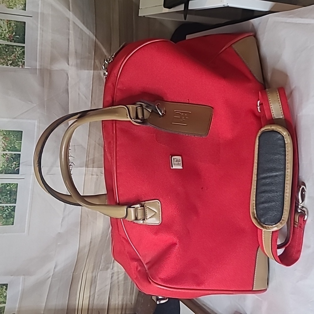 Diane von Furstenberg travel bag.